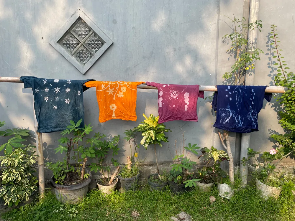 Finished batik drying in the shade of the studio garden